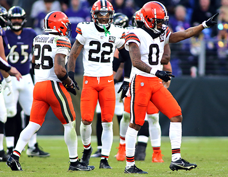 Browns defensive backs Greg Newsome II and Grant Delpit celebrate against the Baltimore Ravens.