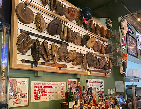 O'Toole's Tavern and Gallery's wall of baseball mitts shows how gloves have changed over time. 