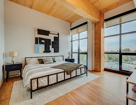 Intro is notable for its timber-frame construction and natural gathering areas.