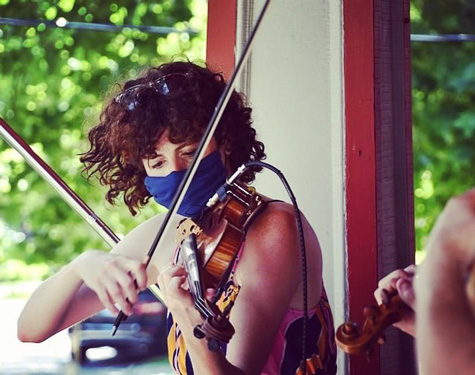 Ariel Clayton, violinist and director of Opus 216 Ariel Clayton, violinist and director of Opus 216