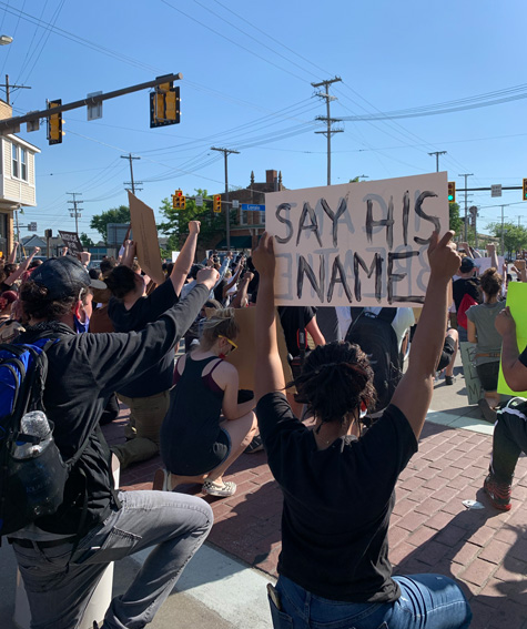 Demonstrators kneel at West 117th Street and Lorain Avenue. Demonstrators kneel at West 117th Street and Lorain Avenue.