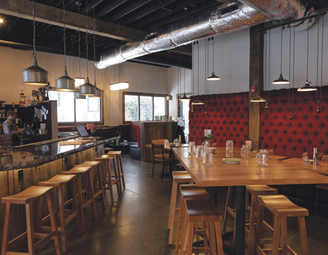 Distill Table’s menu blends bar snacks, comfort dishes and Mediterranean options such as a citrus balsamic salmon with quinoa, chickpeas and roasted red peppers.