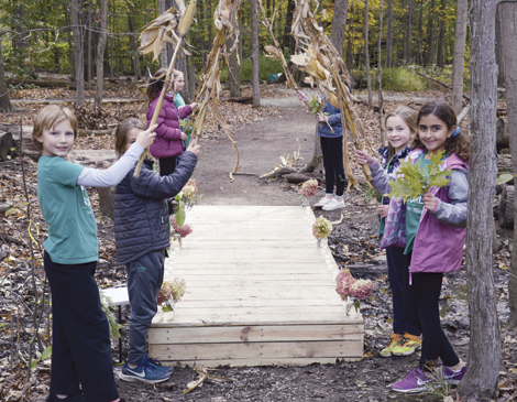  Fourth graders at Laurel School worked together to build and place a bridge on the school’s Butler Campus.