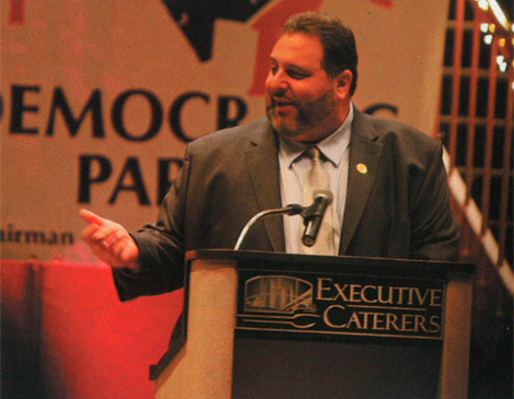 Jimmy Dimora’s emcee act cracked up crowds throughout Cuyahoga County. (He’s shown here hosting the local Democrats’ annual dinner.) The party was nearly unbeatable with him as chairman. 