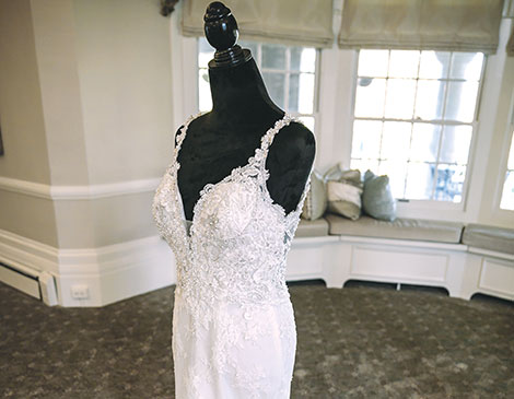 The bride chose a beaded gown trimmed with lace from A Bride’s Design in Avon for the morning ceremony at Shaker Heights Country Club.