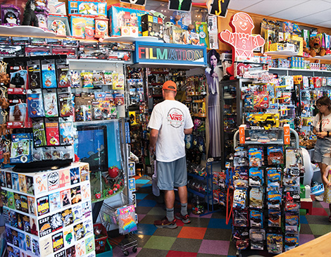 Shopper inside Apple Jax Toys in Lakewood