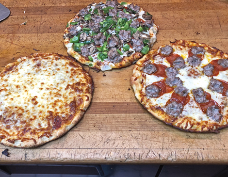 Pizzas from Santo's Italian Restaurant in Middleburg Heights, Ohio