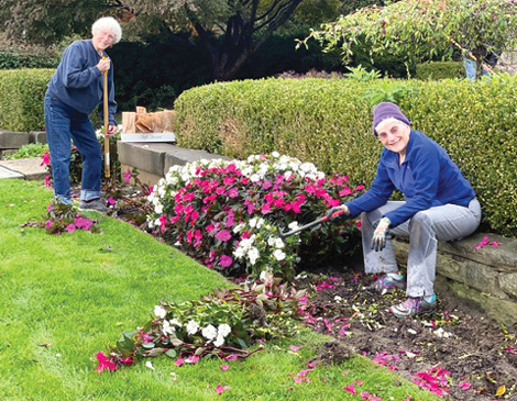 Rocky River Garden Club Members working on landscaping 